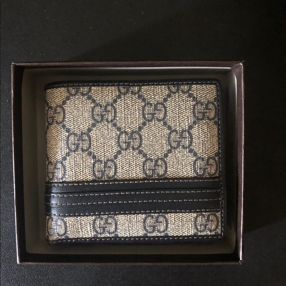 Gucci Other - I've had this wallet for eight months
